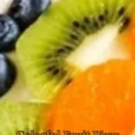 Colorful fruit pizza topped with assorted fresh fruits on a sweet crust.