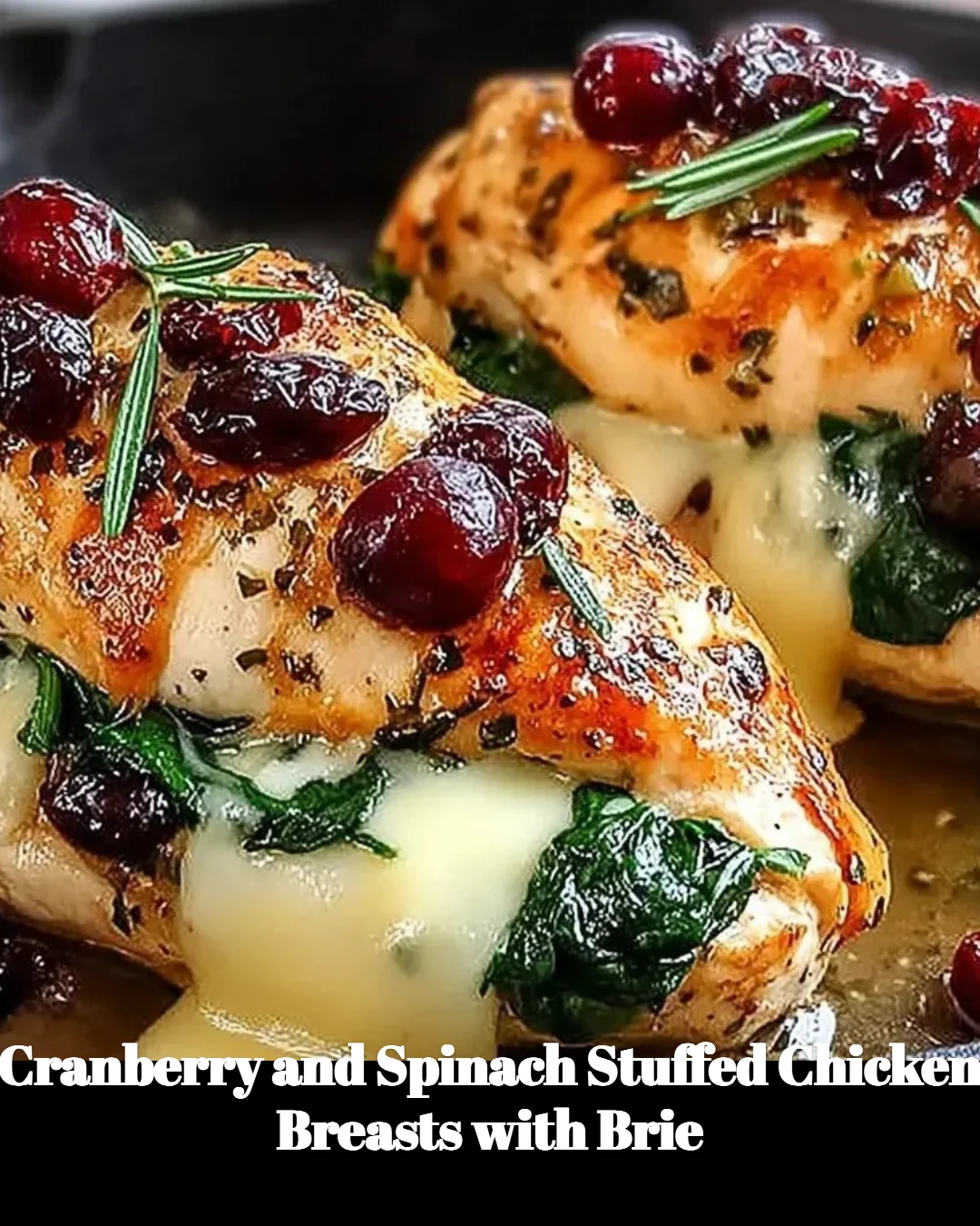 Cranberry and spinach stuffed chicken breasts with brie on a plate