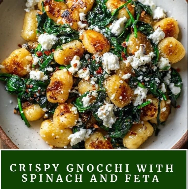 Creamy gnocchi dish with spinach and feta cheese served in a bowl