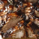 Crockpot Brown Sugar Balsamic Glazed Pork Tenderloin served on a plate