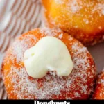 Assorted doughnuts with vibrant frosting and toppings on a display tray.