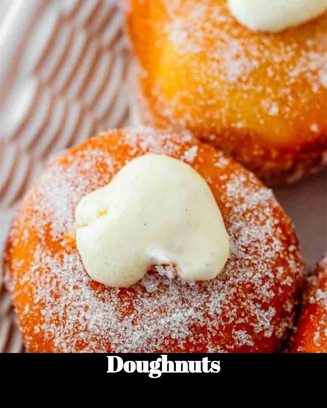 Assorted doughnuts with vibrant frosting and toppings on a display tray.