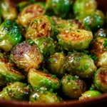 Extra crispy honey garlic Brussels sprouts dish served on a plate