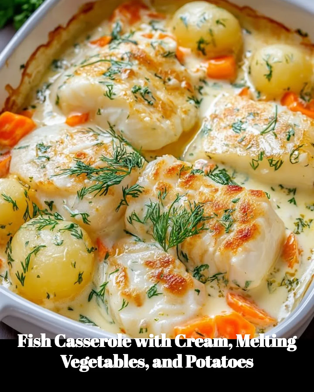 Delicious fish casserole with cream, vegetables, and potatoes baked to perfection