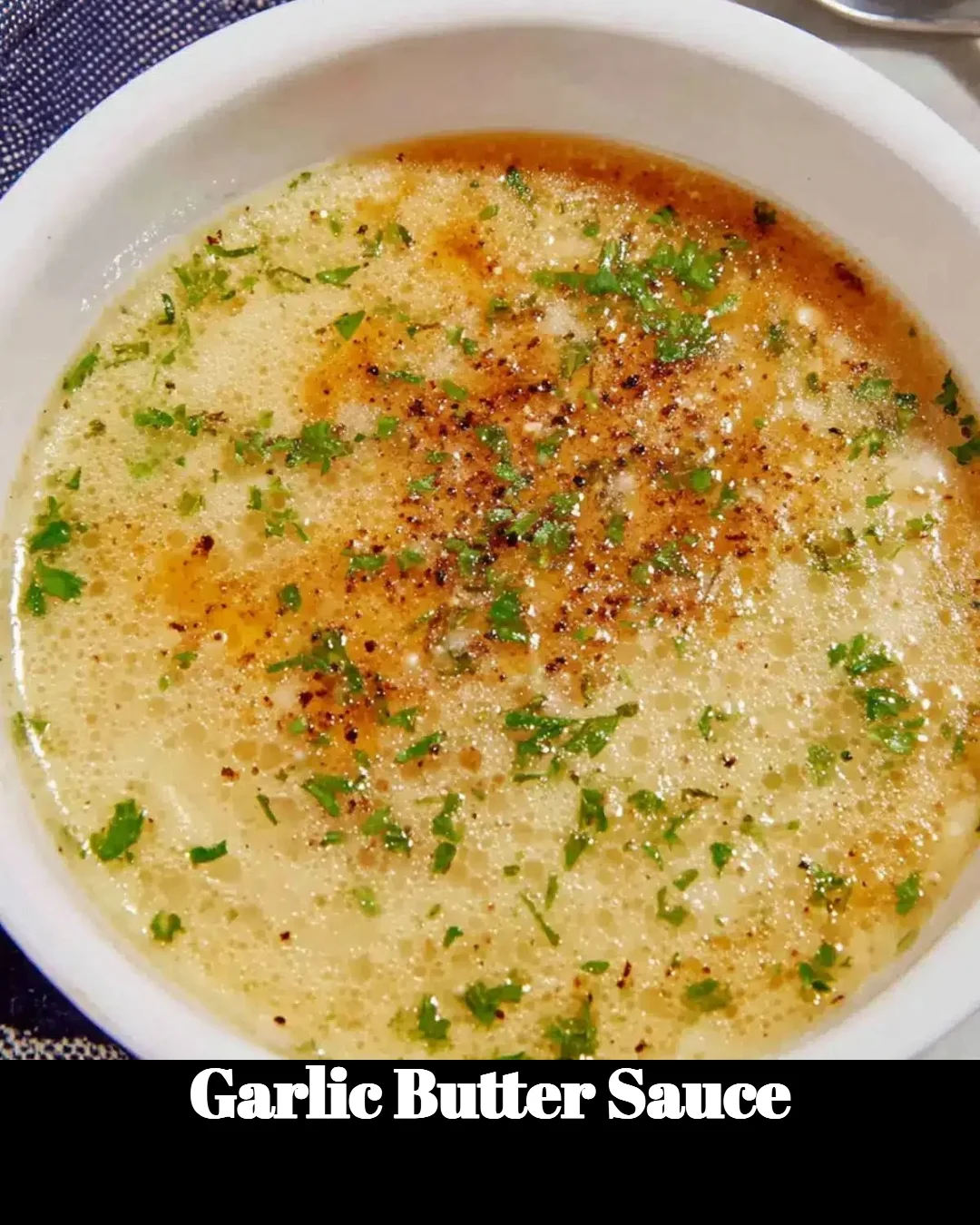 Delicious homemade Garlic Butter Sauce drizzled over a plate of pasta