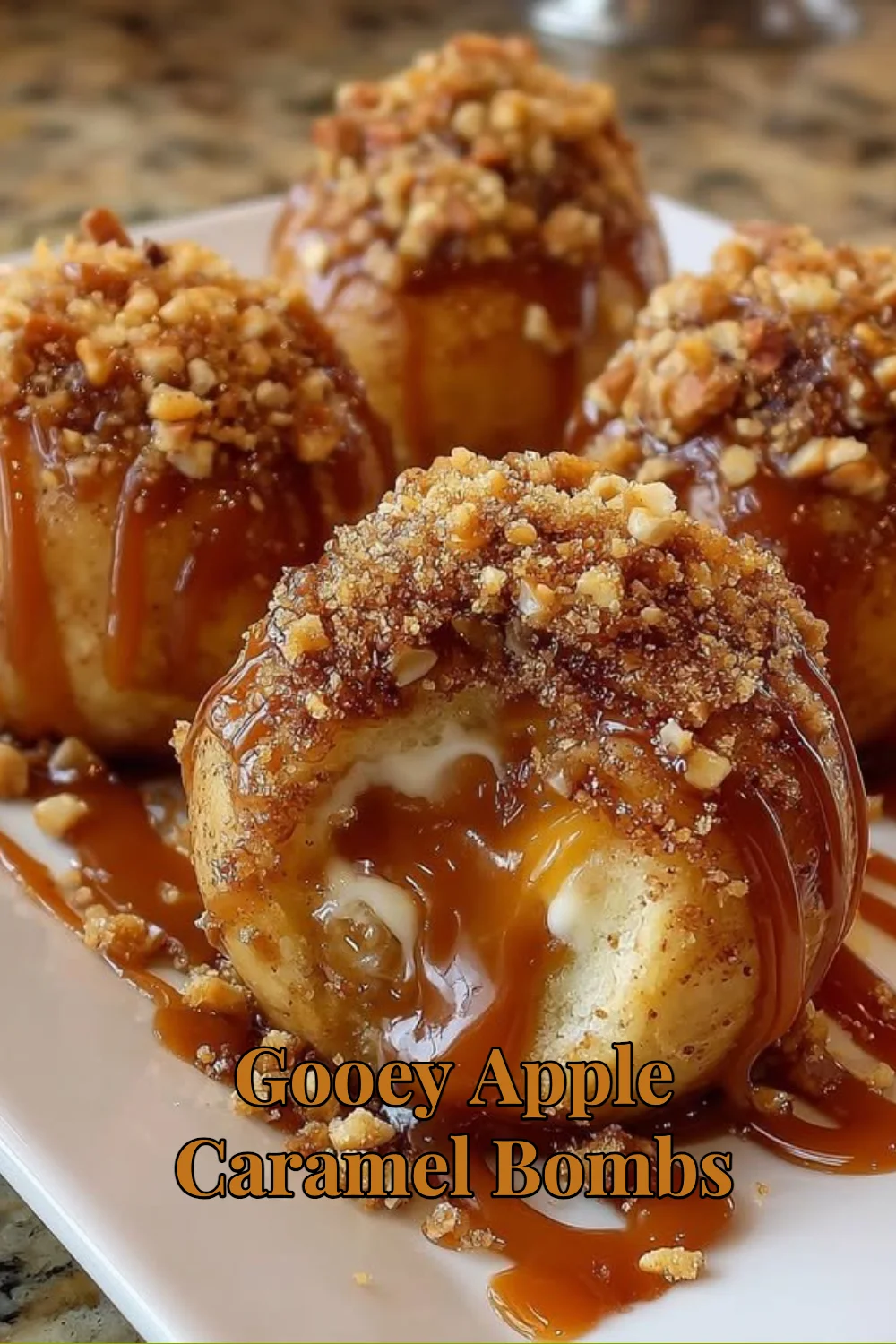 Delicious gooey apple caramel bombs served on a plate with caramel drizzle