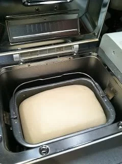 Grandma's versatile rolls fresh out of the oven, golden and fluffy.