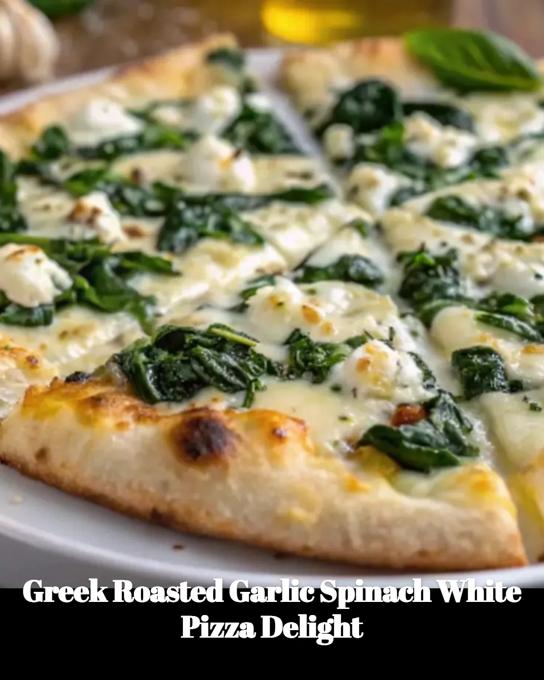 Greek roasted garlic spinach white pizza topped with fresh ingredients