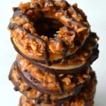 Homemade Samoas cookies made with chocolate and coconut.