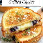 Juicy blueberry grilled cheese sandwich with melted cheese and fresh blueberries
