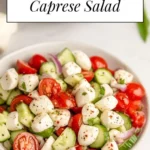 Juicy Cucumber Caprese Salad with mozzarella and basil on a plate