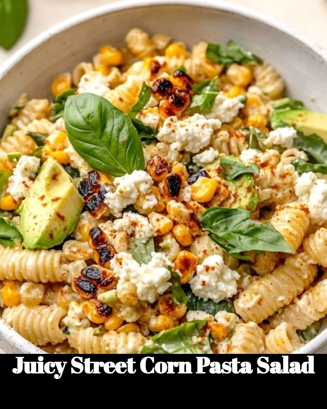 Juicy street corn pasta salad served in a bright bowl