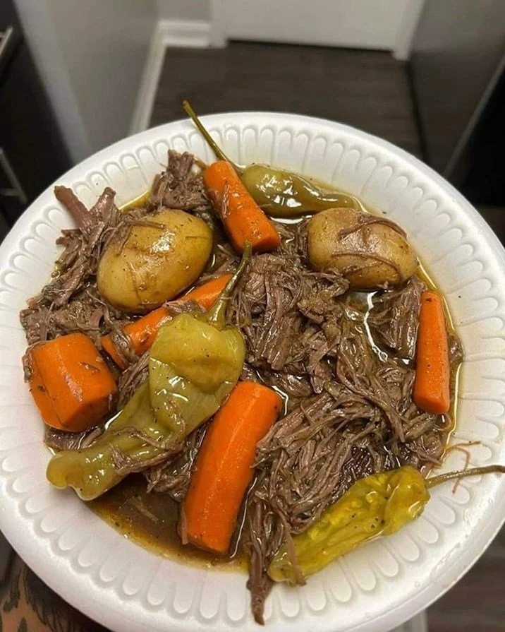 Delicious Mississippi Pot Roast served with vegetables and gravy