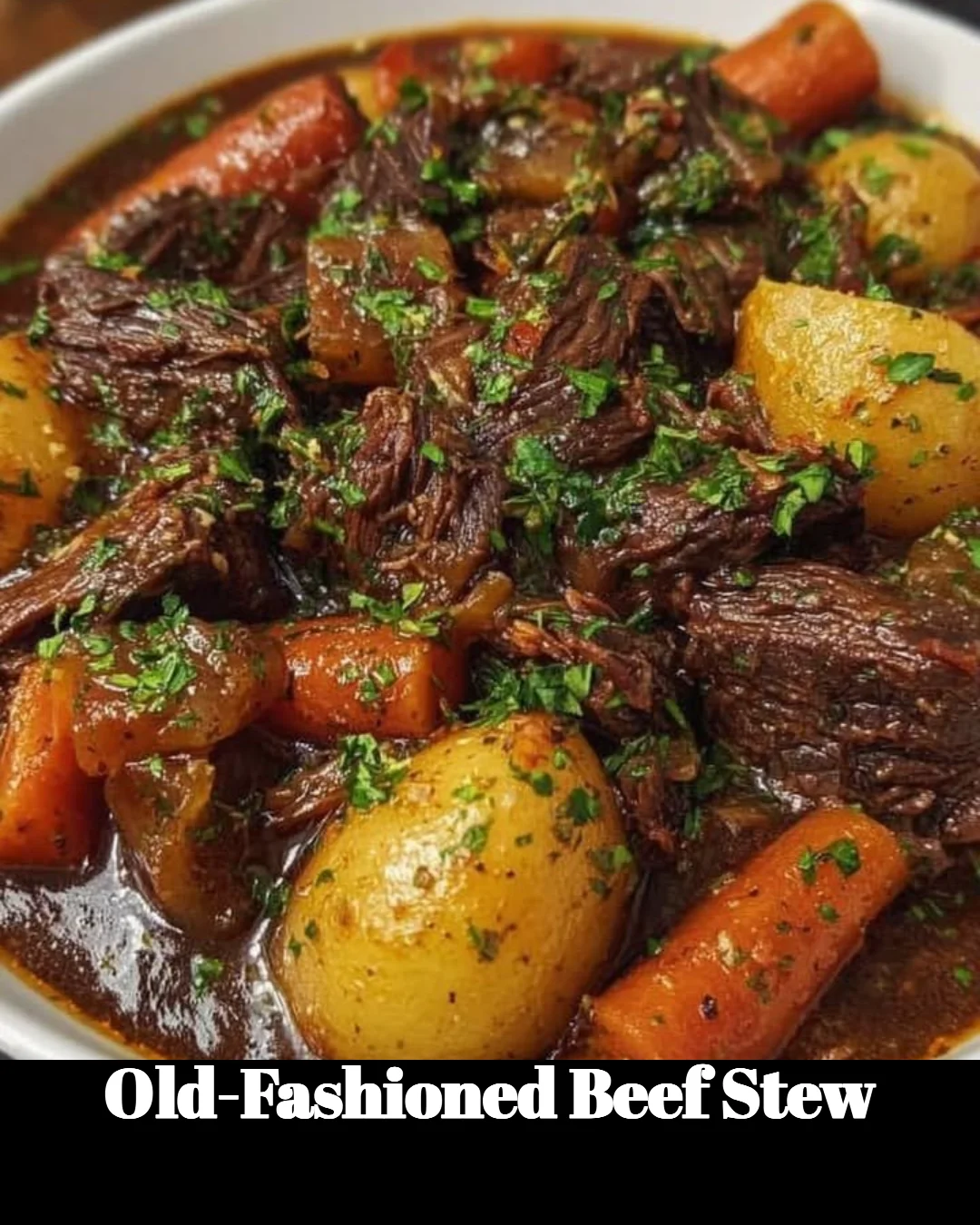 Bowl of Old-Fashioned Beef Stew with vegetables and herbs