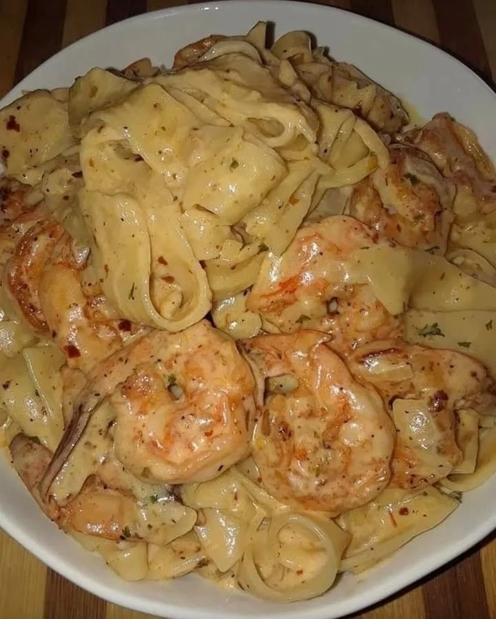 One-Pan Shrimp Fettuccine Alfredo served with herbs and parmesan