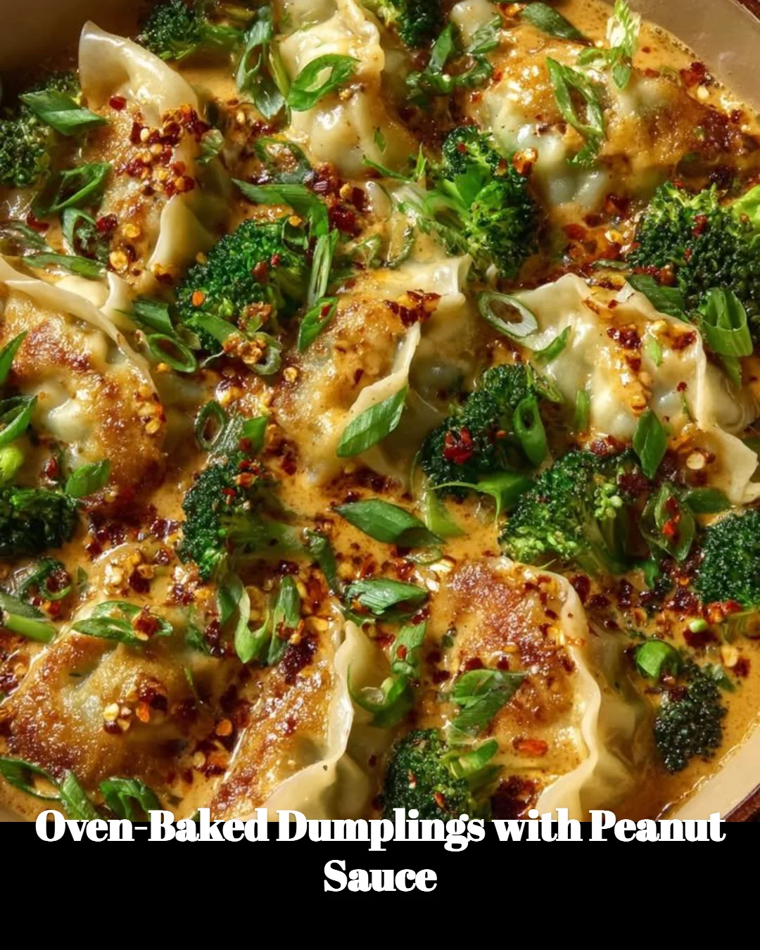 Oven-baked dumplings served with peanut sauce on a plate.