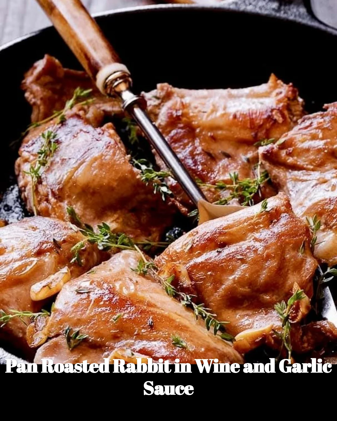 Delicious pan roasted rabbit served with wine and garlic sauce on a plate.