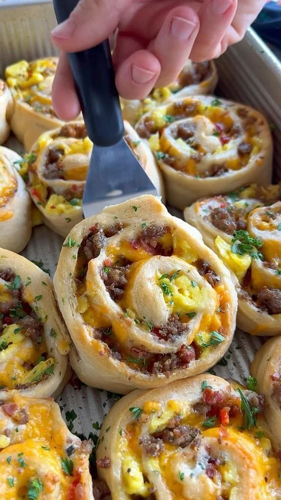 Freshly baked savory breakfast rolls filled with herbs and spices.