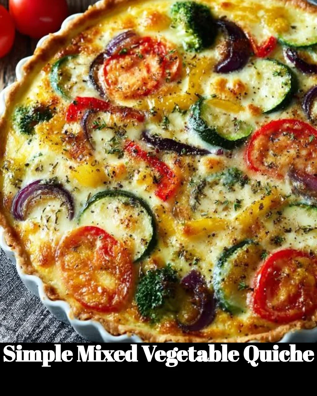 A freshly baked simple mixed vegetable quiche with colorful vegetables.