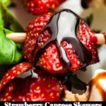 Plate of Strawberry Caprese Skewers with fresh basil and mozzarella