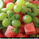 Fresh Watermelon Kiwi Salad with green grapes in a bowl