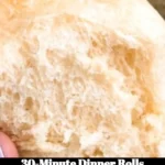 Freshly baked 30-minute dinner rolls on a rustic wooden table