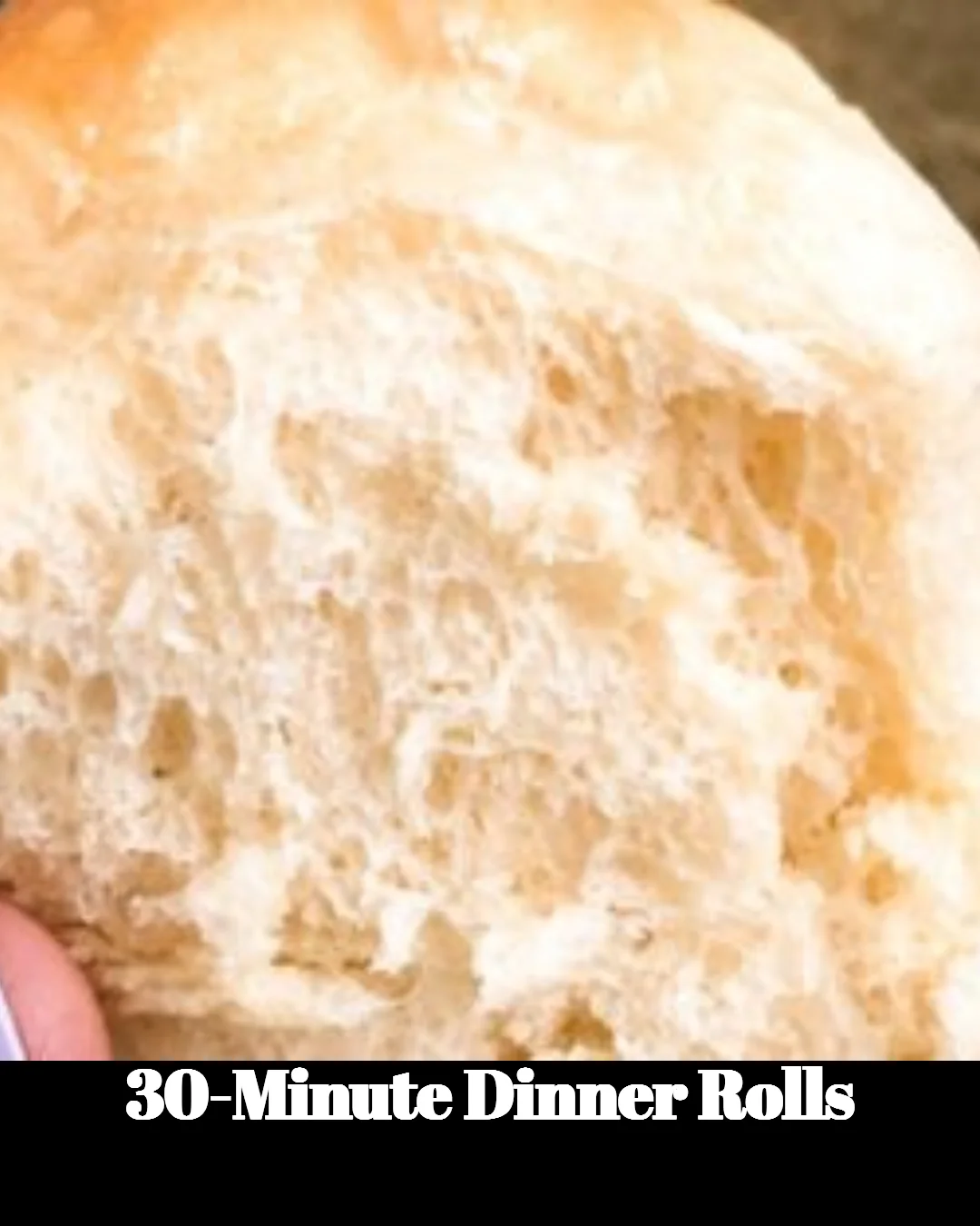 Freshly baked 30-minute dinner rolls on a rustic wooden table