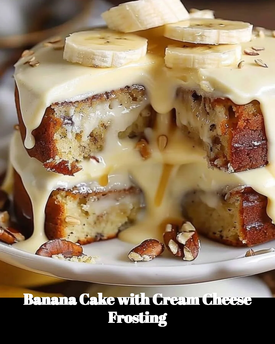 Delicious banana cake with cream cheese frosting on a plate
