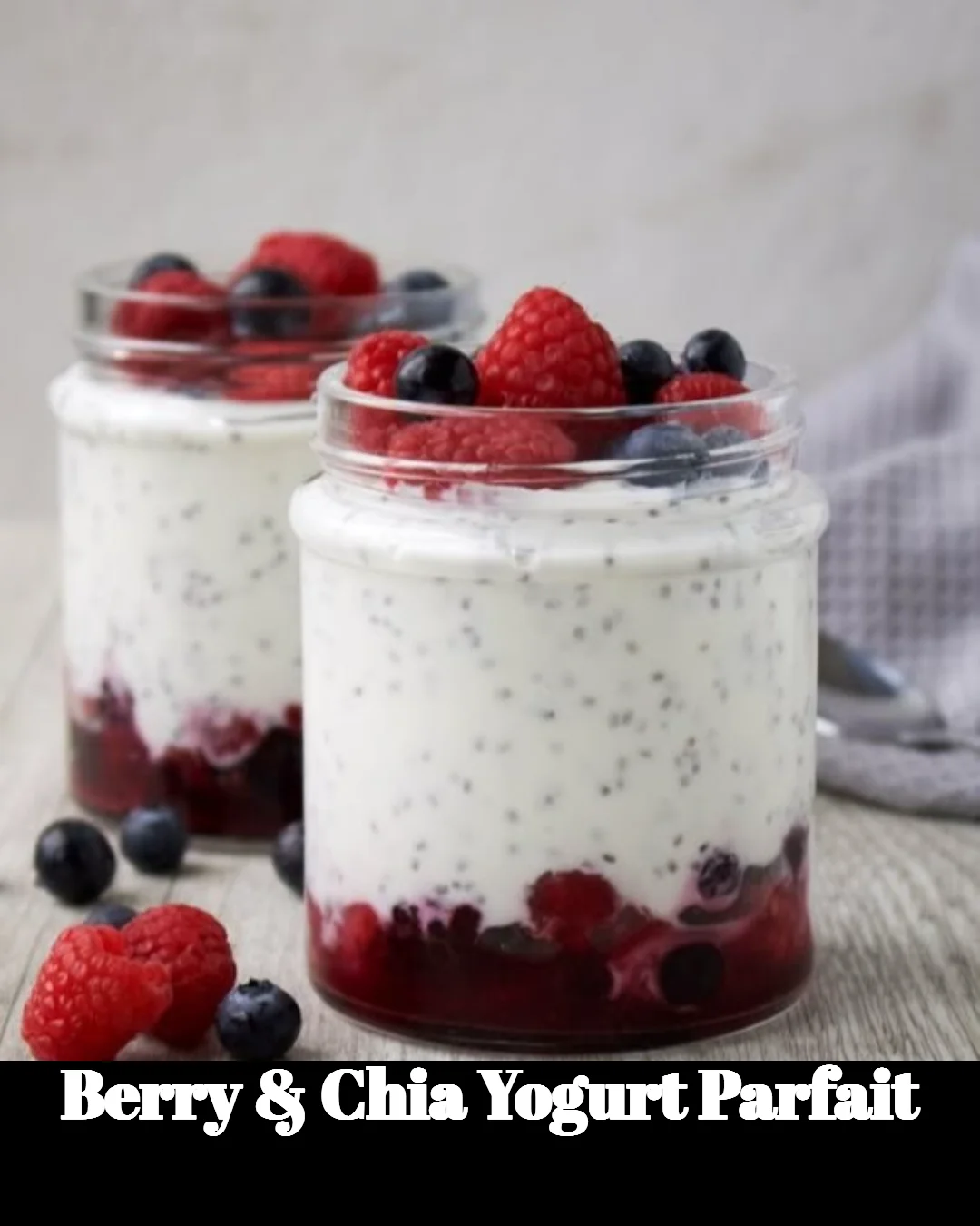 Berry and chia yogurt parfait layered with fresh fruits and yogurt
