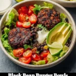 Delicious black bean burger bowls topped with fresh vegetables and sauce