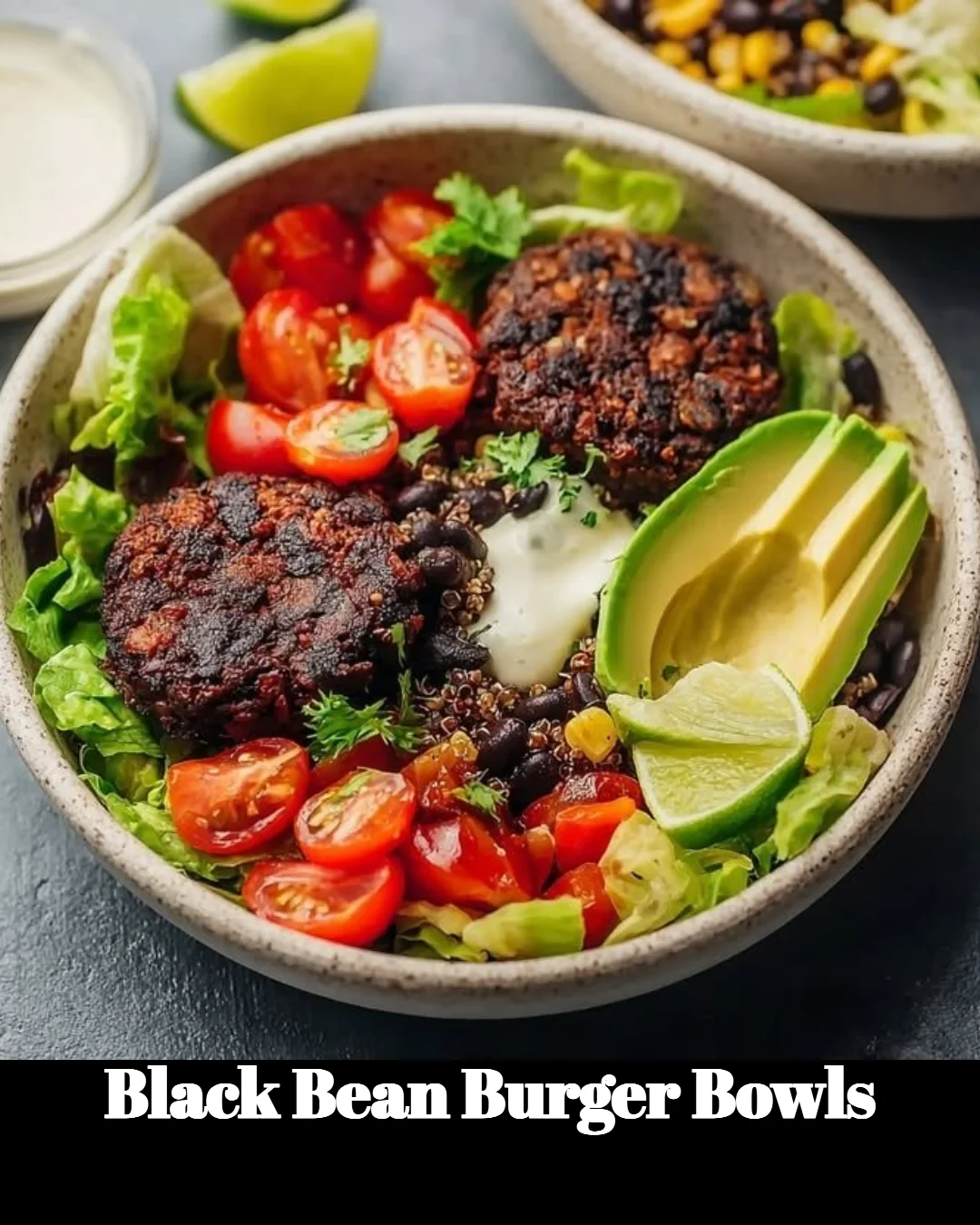 Delicious black bean burger bowls topped with fresh vegetables and sauce