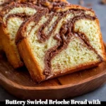 Fluffy brioche bread swirled with Nutella ribbons on a rustic wooden board