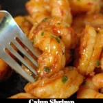 Delicious Cajun shrimp dish garnished with herbs and spices