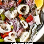Delicious calamari salad with fresh vegetables and zesty dressing