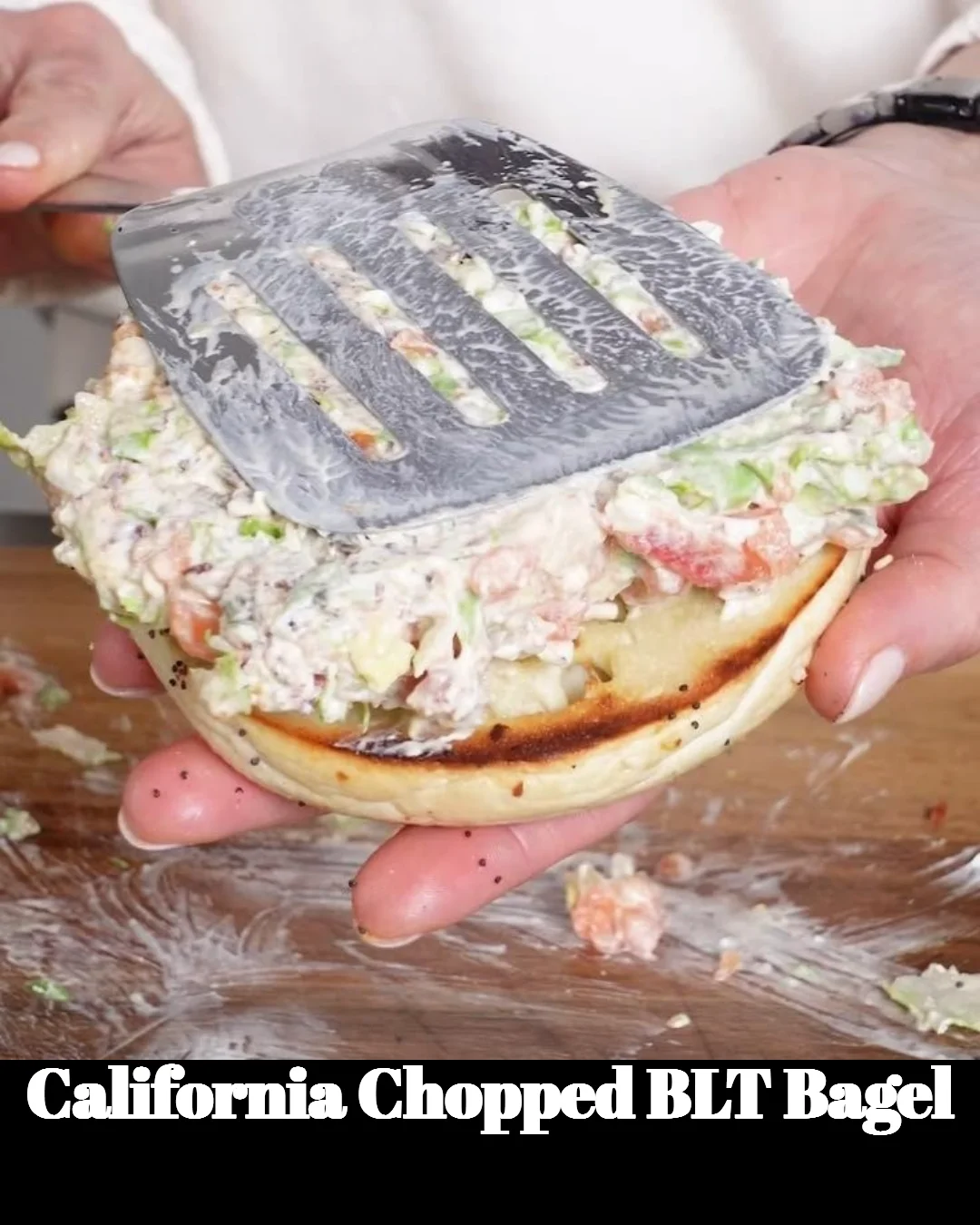 California Chopped BLT Bagel loaded with bacon, lettuce, and tomatoes.