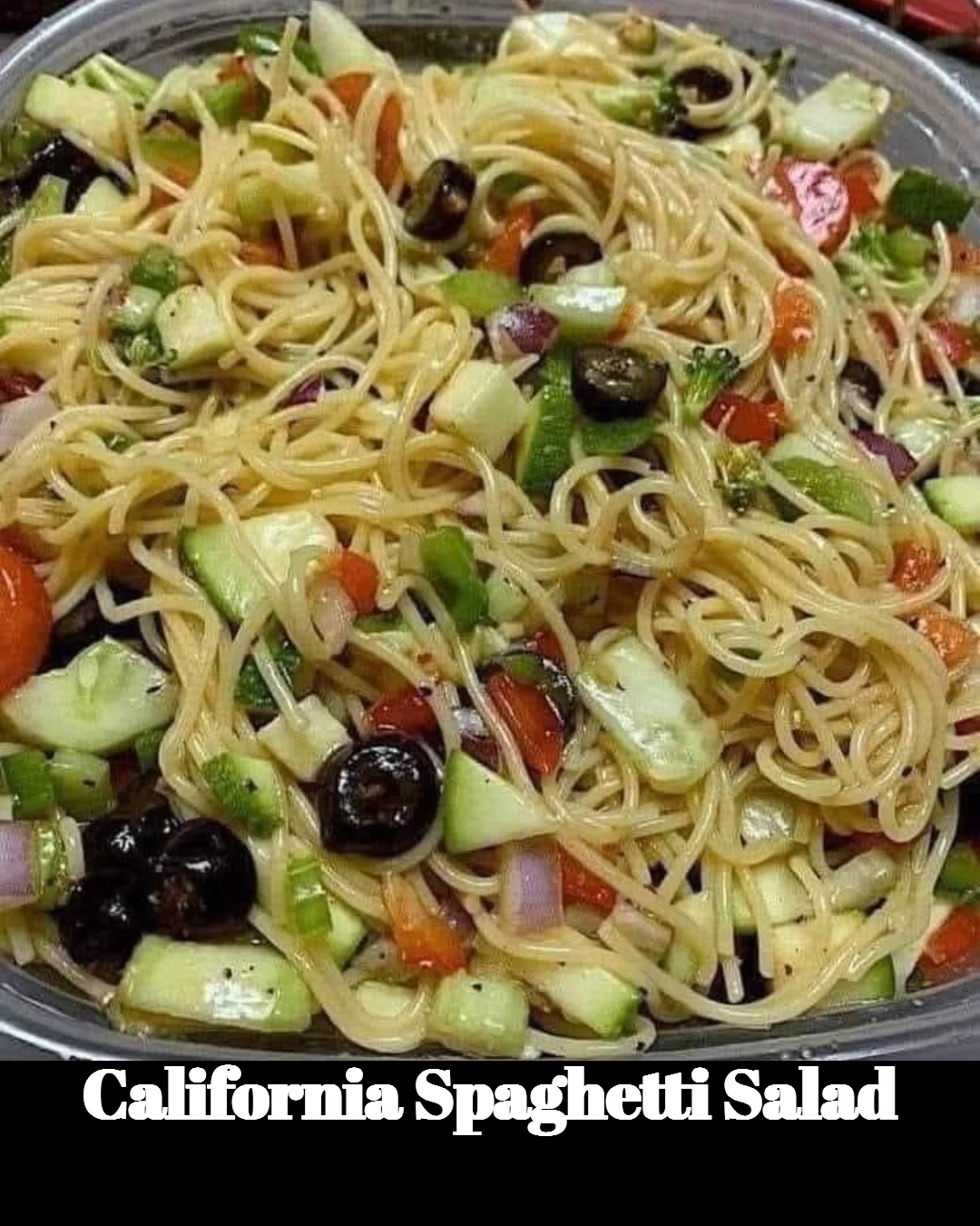 Colorful California Spaghetti Salad with fresh vegetables and dressing