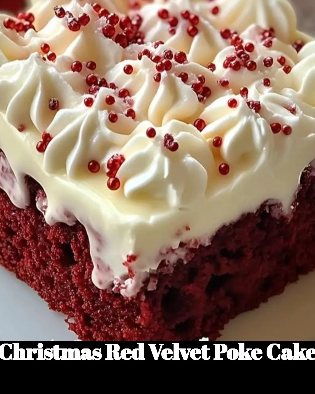 Delicious Christmas Red Velvet Poke Cake topped with cream cheese frosting