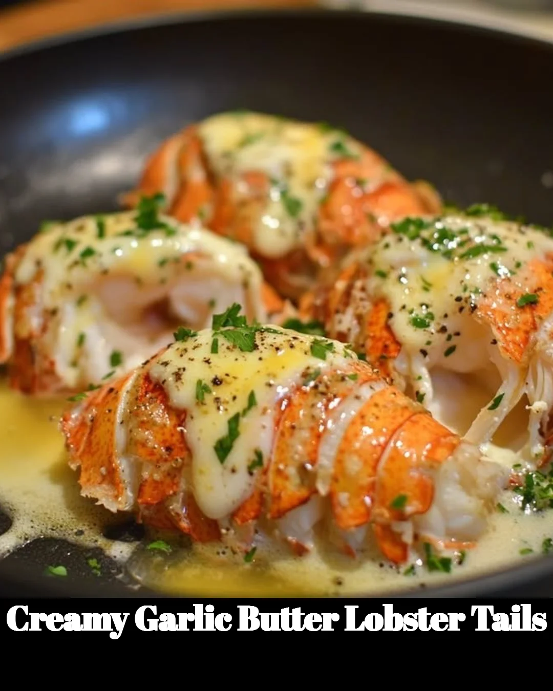 Delicious creamy garlic butter lobster tails served on a plate.
