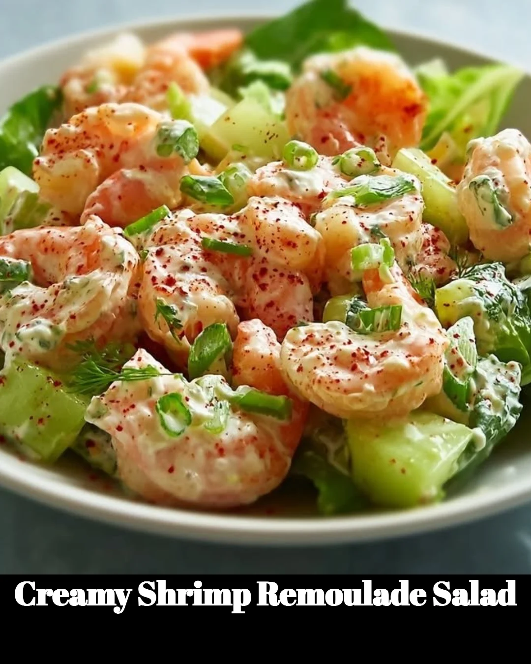 Creamy shrimp remoulade salad served in a bowl with fresh vegetables