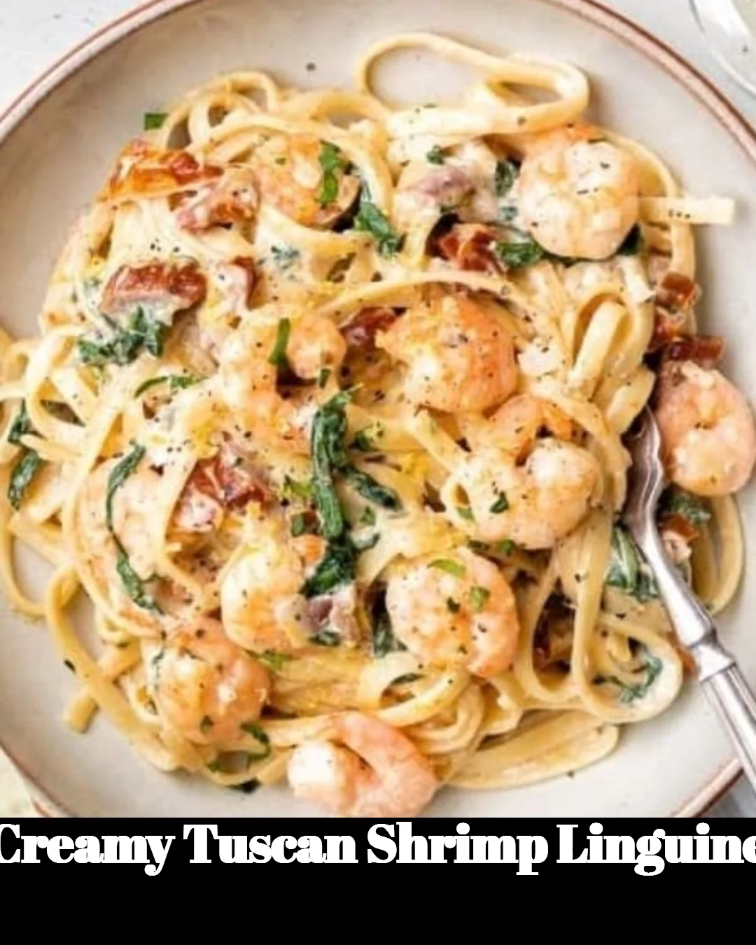 Creamy Tuscan shrimp linguine served with fresh herbs and parmesan cheese