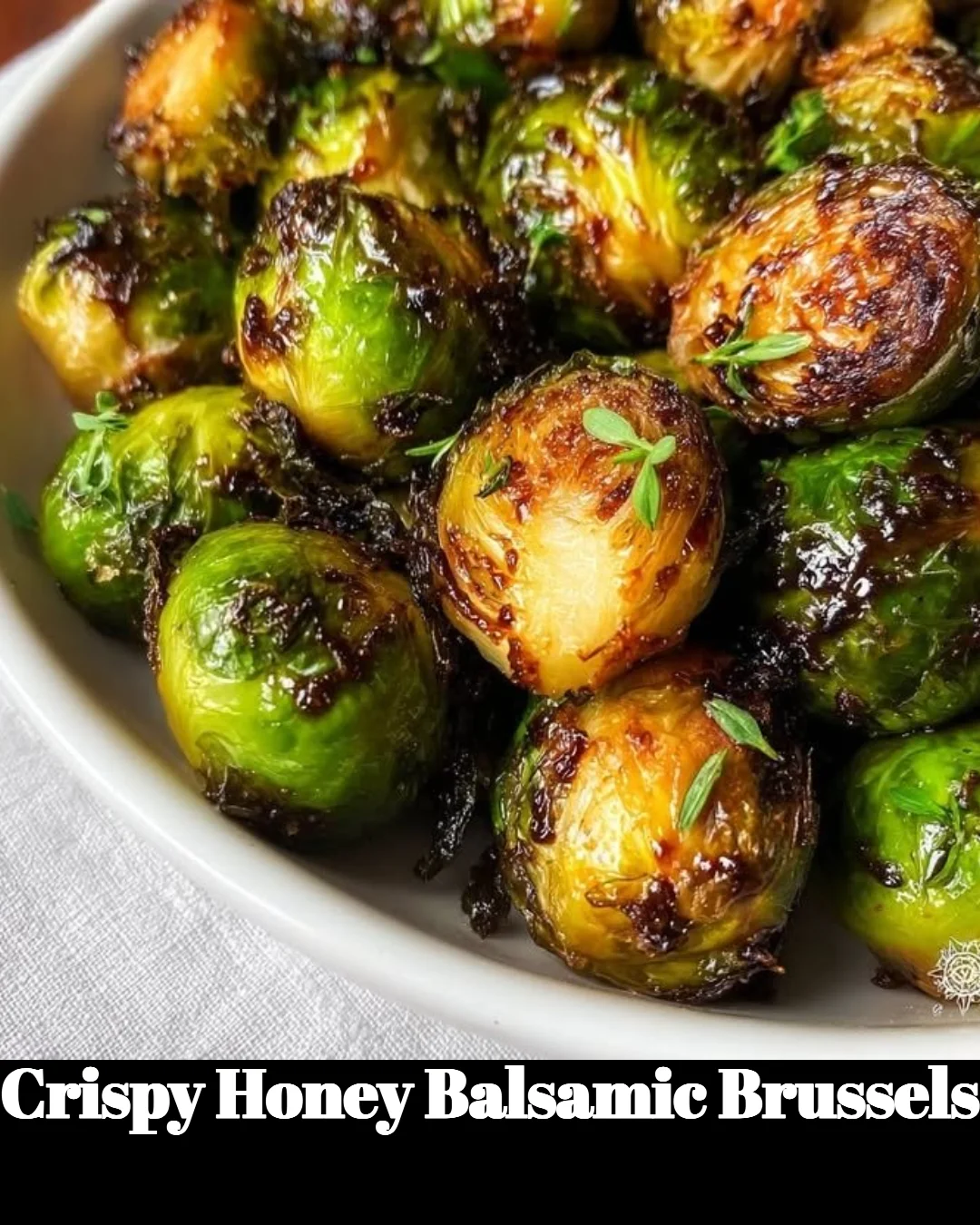 Crispy Honey Balsamic Brussels sprouts served on a plate.