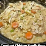 Bowl of homemade Crockpot Chicken Noodle Soup with fresh ingredients