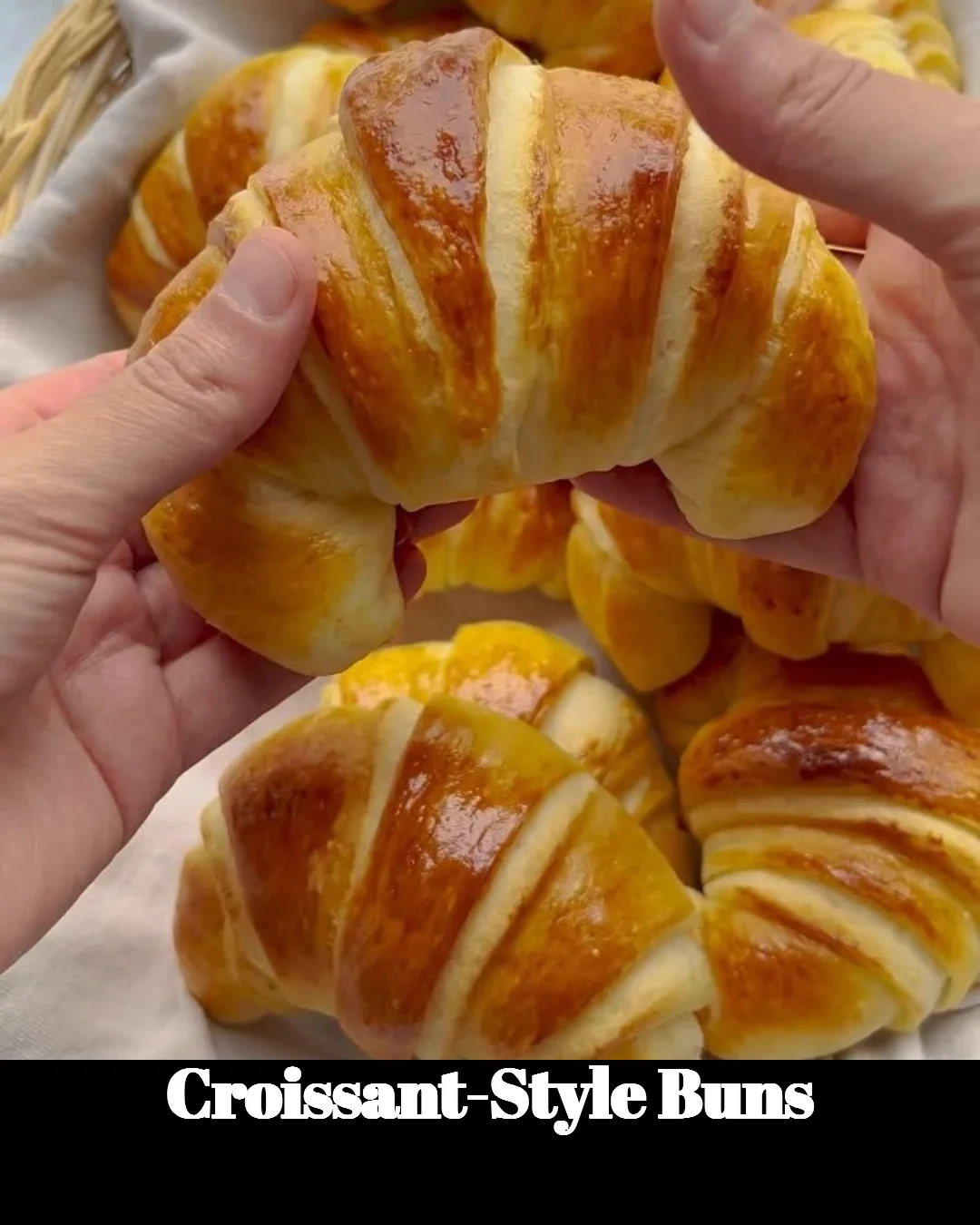 Freshly baked croissant-style buns ready to be served