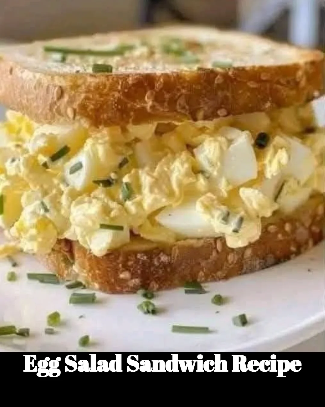 Delicious homemade egg salad sandwich on a plate