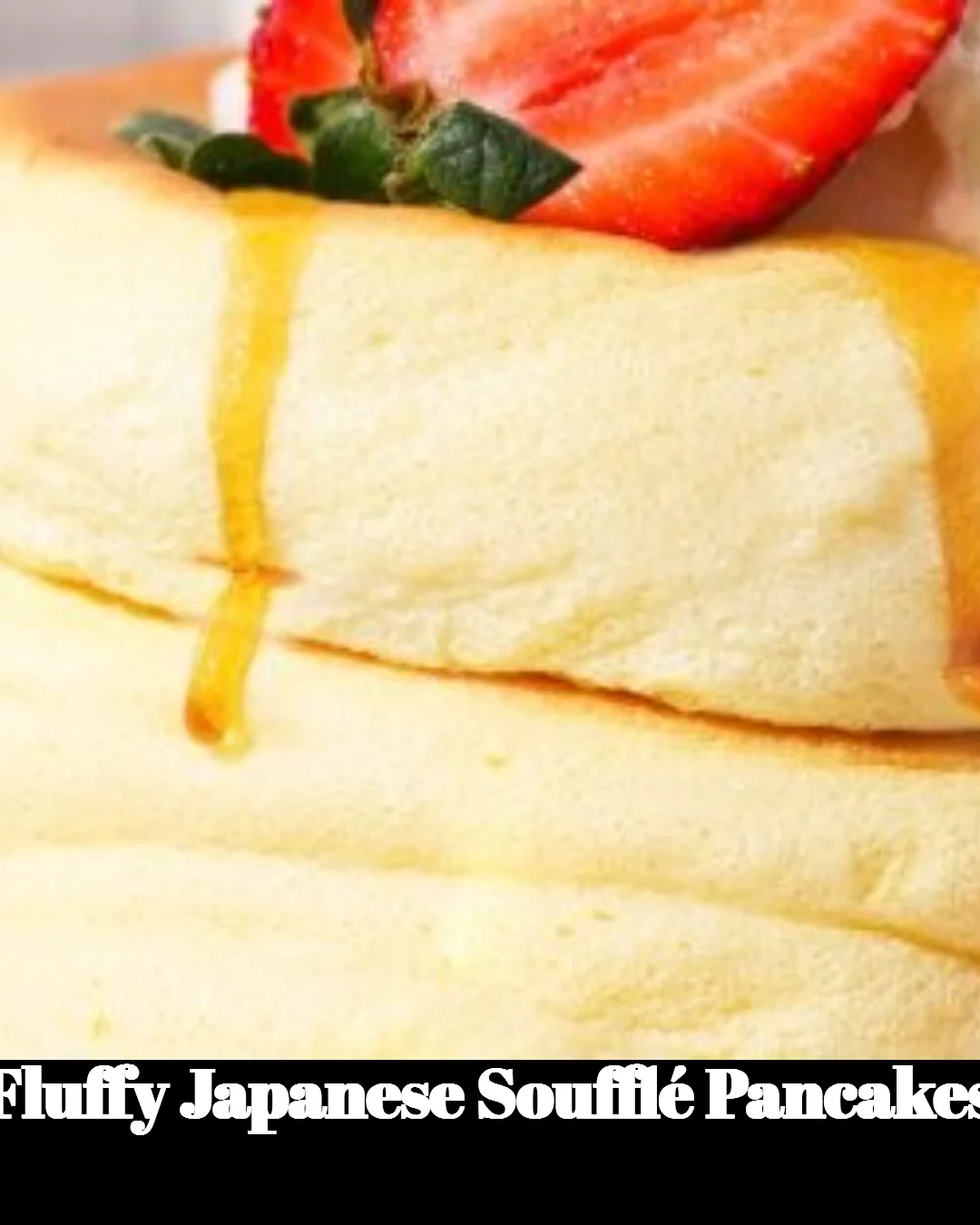 Fluffy Japanese soufflé pancakes stacked and drizzled with syrup.