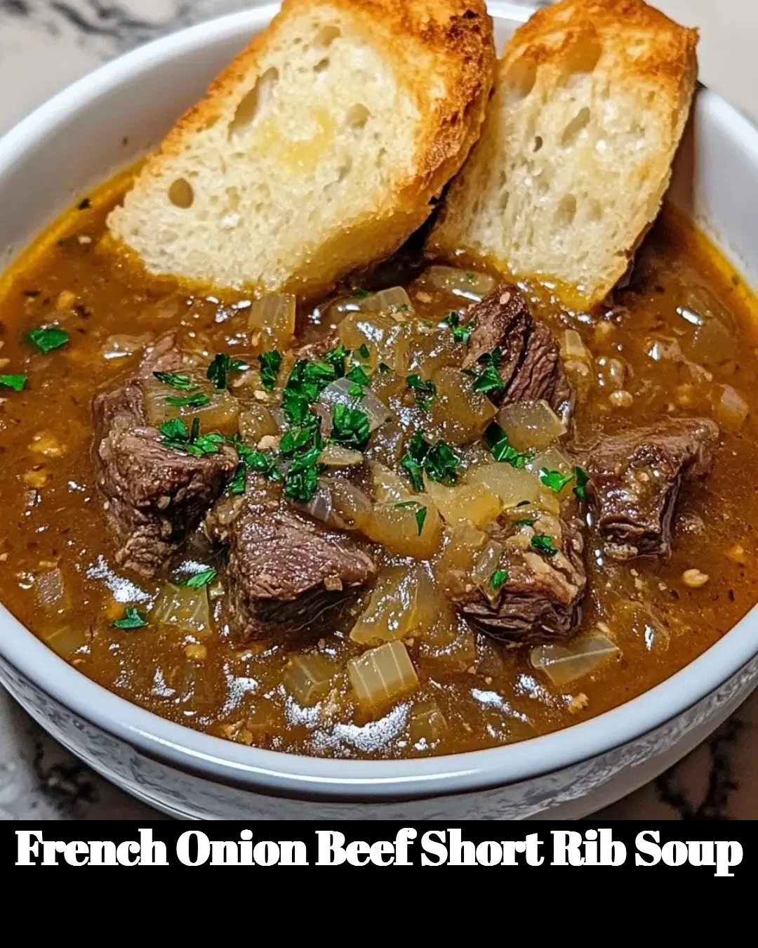 Bowl of French Onion Beef Short Rib Soup with melted cheese on top