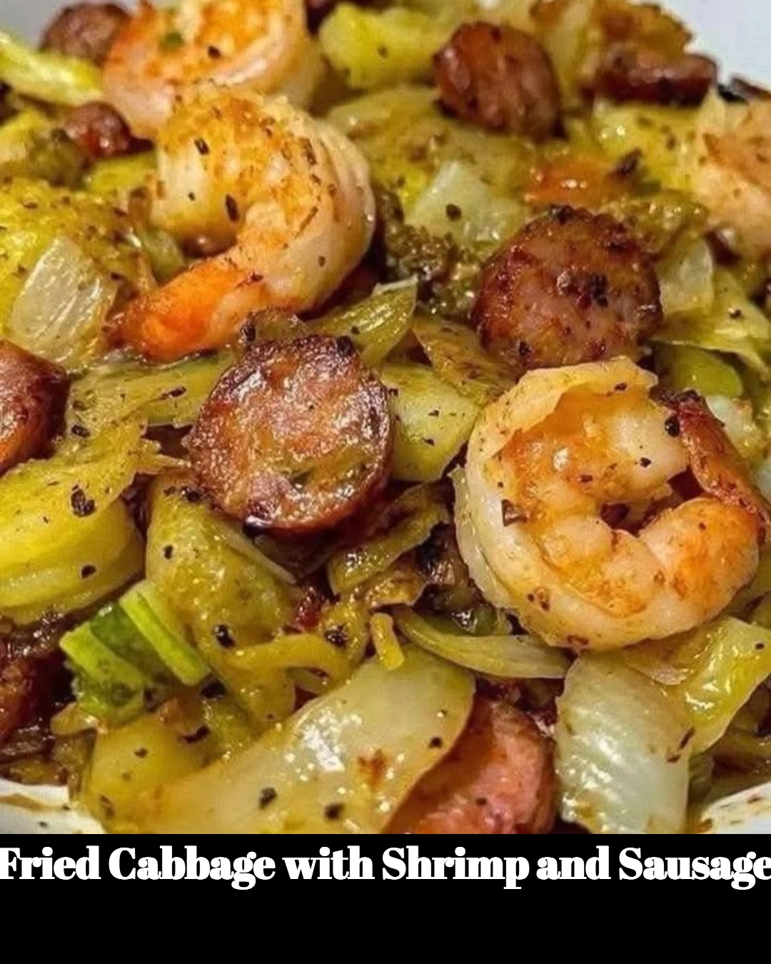 Delicious plate of fried cabbage with shrimp and sausage