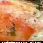 Delicious Garlic Butter King Crab Legs served with lemon and herbs