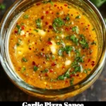 A bowl of garlic pizza sauce ready for spreading on dough.