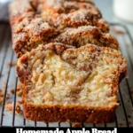 Freshly baked homemade apple bread with slices showing tender texture
